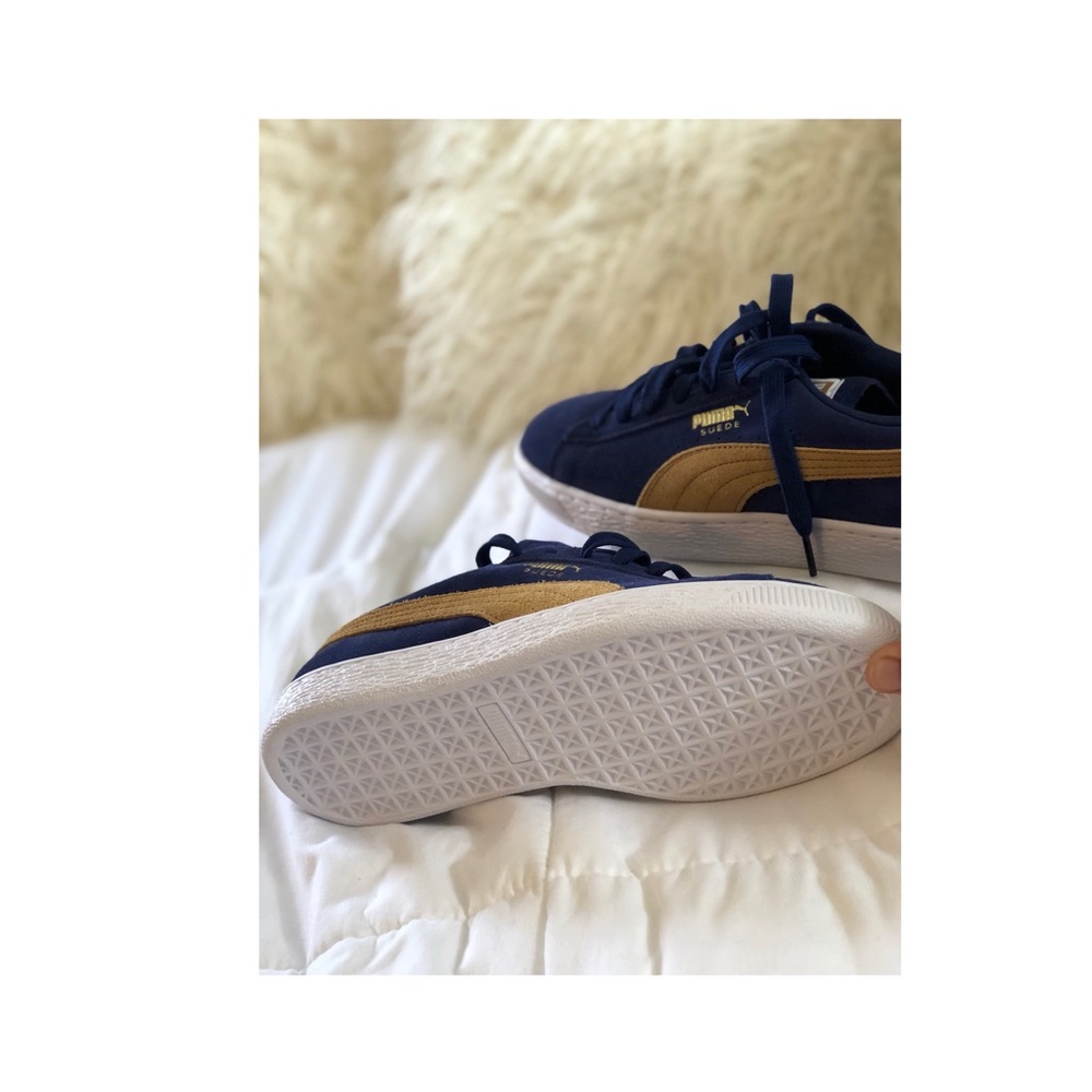 Navy blue puma sneakers